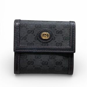 Gucci Black and Gold mini Monogram Coin Holder